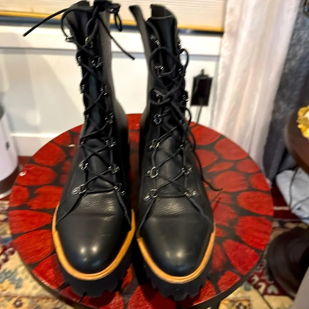 Absolutely gorgeous ALL BLACK platform Boots like new!